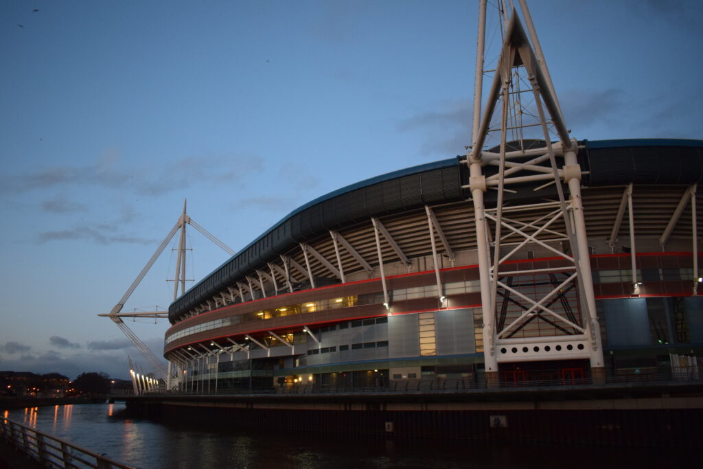 Cardiff at dusk: the Principality Stadium and the river Taff, anchoring the HRS Family Law Cardiff office on Malthouse Avenue.